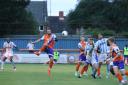 High kicks: Braintree Town captain John White tries a shot during his side's home defeat to Maidstone United.