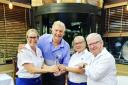 BIG WIN: Sir Trevor Brooking pictured with Blue Strawberry Bistrot staff and their award