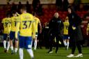 Away day blues - Colchester United boss Matty Etherington with his players after the final whistle at Doncaster Rovers
