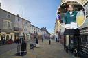 Town Centre - Braintree's High Street and an inset image of a Braintree Area Foodbank volunteer