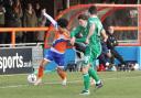 Held back: Braintree Town's Aaron Blair finds himself closely monitored by Yeovil Town during the Iron's 1-0 defeat.