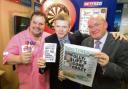 A good bet: Darts star Peter Manley, reporter Ryan McCarthy and branch manager Paul Sanders at Betfred in Newland Street, Witham