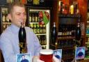 Cheers: David Boys, Manager at The Battesford Court, serves up a pint of Olly! Olly! Olly!