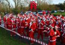 PRESENT AND CORRECT: Santas line up at a previous run