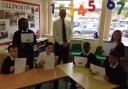 Winner: Nick with some of his pupils at Powers Hall Academy