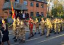 The parade marches past Causeway House in Braintree