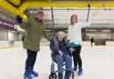 Doreen Barber on the ice with daughter Nina Martin (left) and lifestyle coordinator at her care home Jess Wolohan (right) (Picture: PA)