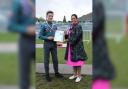 RECOGNISED - Dame Priti Patel presents Alexander with his Chief Scout’s Gold Award