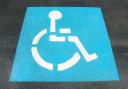 Parking- an illustrative image of a disabled parking space sign