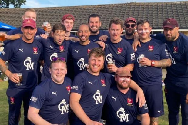 Glory days: Witham Cricket Club players celebrate after gaining promotion to the East Anglian Premier League.