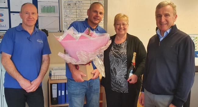 Loyal: Linda was presented with some flowers and champagne from directors of Maycast Derek Redgwell, Steve Wallings and Dave Blower