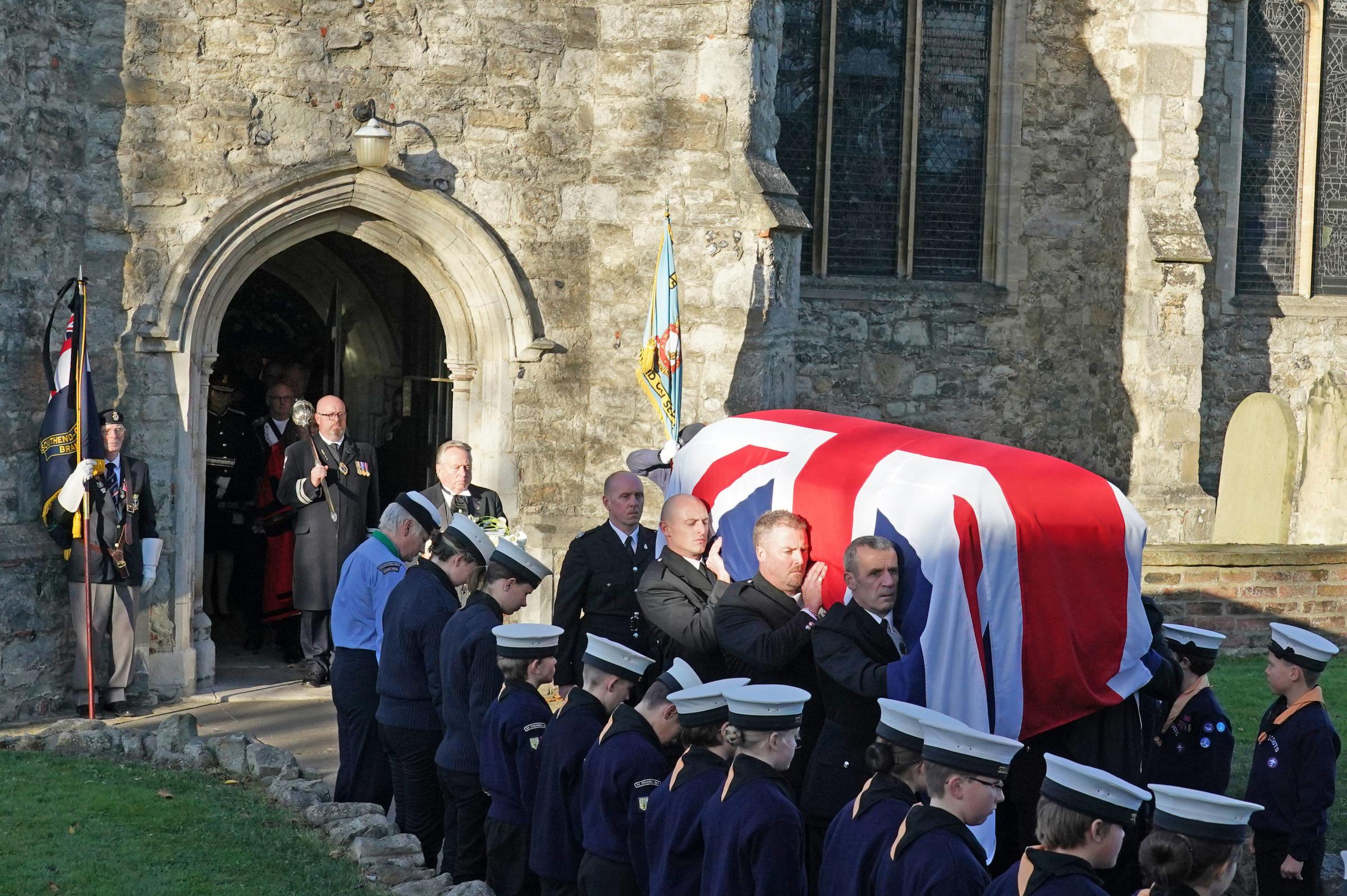 Pall bearers carry the coffin of Sir David Amess out of St Marys Church in Prittlewell, Southend, following his funeral service. Picture date: Monday November 22, 2021. PA Photo. Southend West MP Sir David was killed during a constituency surgery in