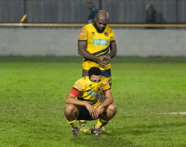 Anguish: Witham Town duo Jamahl Godward and Greg Akpele show their frustration after the match against Hullbridge Sports. Picture: JIM PURTILL