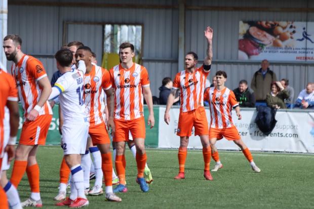 Hands up: Braintree Town's players await a set-piece during their 4-0 defeat at Havant and Waterlooville. Picture: JON WEAVER