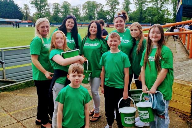 The Braintree Macmillan Fundraising Group pictured on the final day of Braintree Town's season