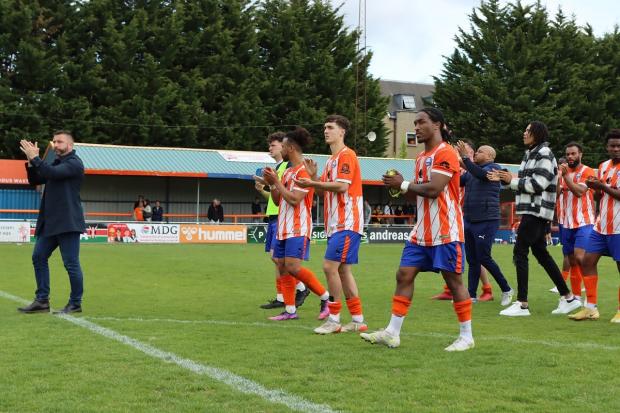 Grateful: Braintree Town's players thank their fans following their final game of the season against Billericay Town. Picture: JON WEAVER
