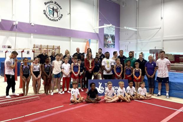 Braintree and Witham Times: Max Whitlock (left), Georgia-Mae Fenton (centre) and Courtney Tulloch poses for photographers at the South Essex Gymnastics Club (PA)
