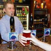 Cheers: David Boys, Manager at The Battesford Court, serves up a pint of Olly! Olly! Olly!