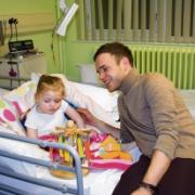 Olly Murs entertains Millie Crocombe, three.