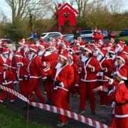 PRESENT AND CORRECT: Santas line up at a previous run