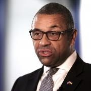 James Cleverly has defended his previous advice to LGBT fans travelling to Qatar for the World Cup