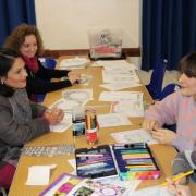 Ms Patel with a parent and youngsters at the new Silver End Youth Club