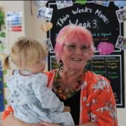 Jane pictured with granddaughter Iris
celebrating her retirement at Powers Hall Academy