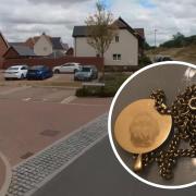 A gold pendant was one item taken during the burglary in Dairy Lane