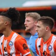 Looking on: Braintree Town duo Aaron Blair and Matt Rush wait for a delivery against Weymouth.