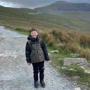 Brave - Inspirational Jacob Tompkins smiles his way to the top of Snowdon