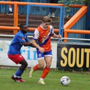 On the ball: Tom Blackwell in action for Braintree Town in their victory against Worthing.