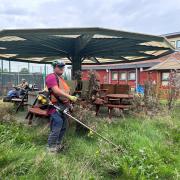 Braintree Council horticultural operatives tending to the overgrown grounds at the PARC (Essex) site in Great Notley