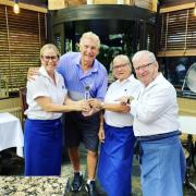 BIG WIN: Sir Trevor Brooking pictured with Blue Strawberry Bistrot staff and their award
