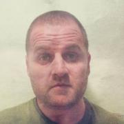 Wanted- photograph of Kelvin John released by Enfield MPS