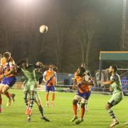 High rise: Joe Grimwood leaps for a header during Braintree Town's win over Tonbridge Angels.