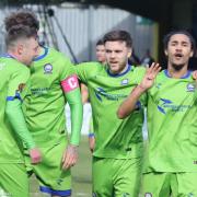 Team spirit: Braintree Town's players celebrate after scoring against St Albans City.