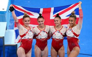Great Britain's Alice Kinsella, Jennifer Gadirova, Jessica Gadirova and Amelie Morgan celebrate winning bronze after the Women's Team Final at the Ariake Gymnastics Centre on the fourth day of the Tokyo 2020 Olympic Games in Japan