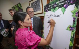 Visit - Priti Patel, MP for Witham, attended the unveiling of the report and met with David Guest, a local blackcurrant grower from the area