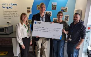 Amazing - Left to Right: Tina Tofts, Lio Lopez-Welsch, Nat Wright and Craig Budd from Aegon UK with the cheque for Children With Cancer UK.