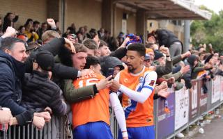 Magic moment:  Jayden Davis celebrates with his team-mates and fans after scoring Braintree Town's winner at Chelmsford City.